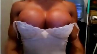 Webcam Carla Flexing Pecs and Arms in White